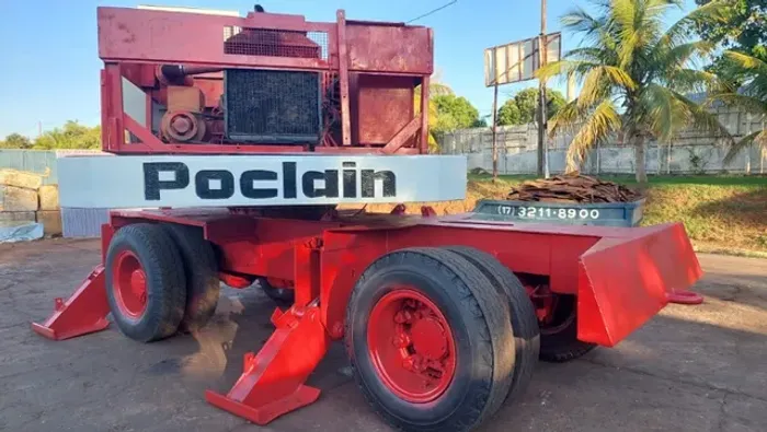 escavadeira poclain ly 80 de pneus com eletro imã