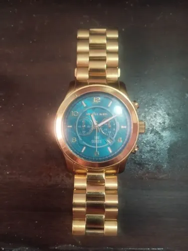 Relógio Mk Parker Feminino Dourado Mk8315 100m