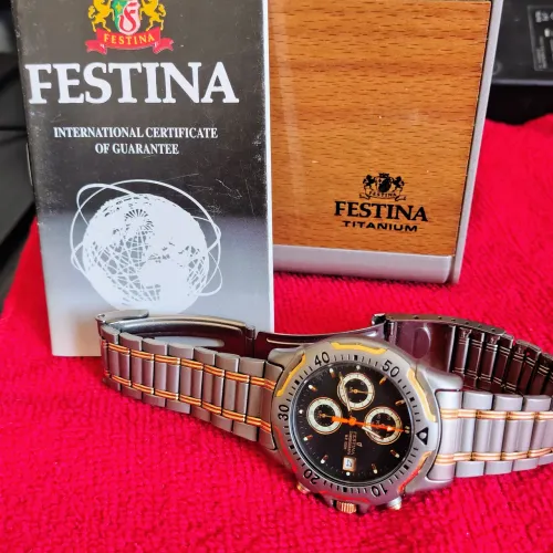 Relógio festina Titanium série ouro troco por Citizen