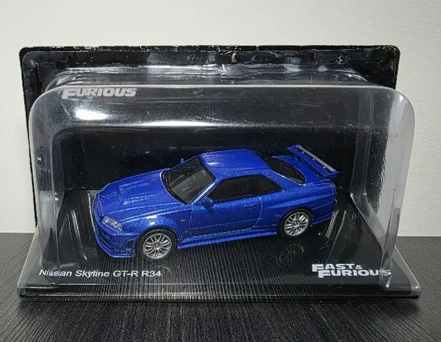 Miniatura Velozes e Furiosos 1/43 Nissan Skyline GT-R R34 Azul edição 25 - Salvat Luppa