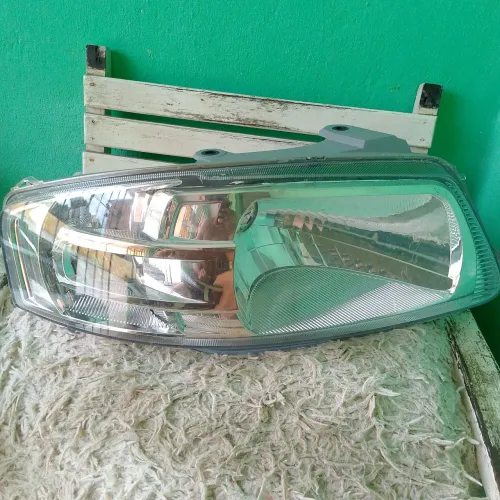 Farol lado direito do gol g4 original