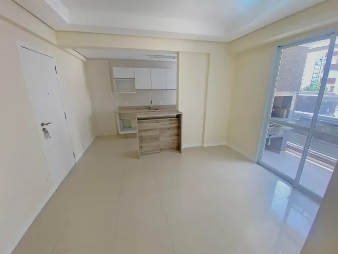 Locação de apartamento 2 dormitórios sendo 1 suíte junto ao MC Donalds Beira Mar Norte Agr