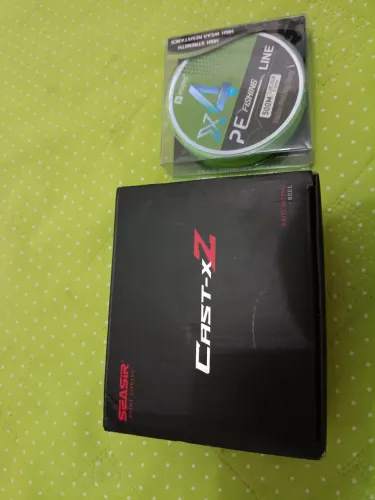 Carretilha cast XZ manivela esquerda com carretel linha multifilamento 500 metros