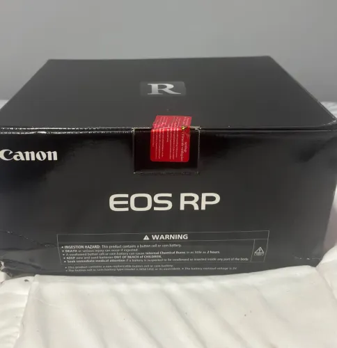 Canon RP na caixa e Lacrada