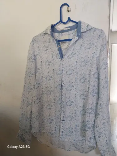 Vendo camisa da Richards puro linho original.Pouco usada.