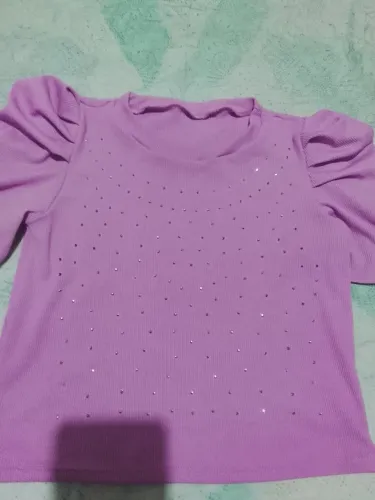 Vende se está blusa em estado perfeito excrlente