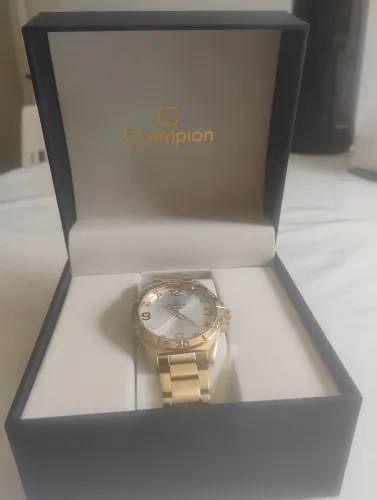 Vendo relógio Champion dourado