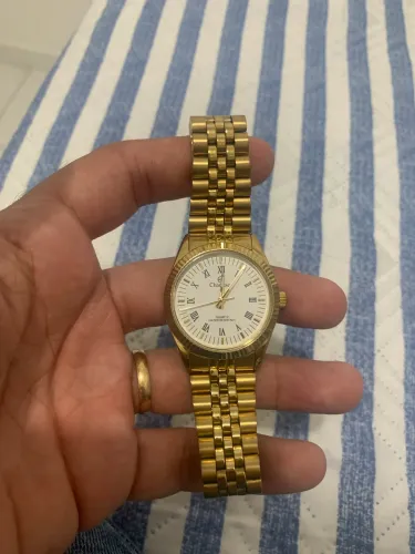Relogio technos dourado