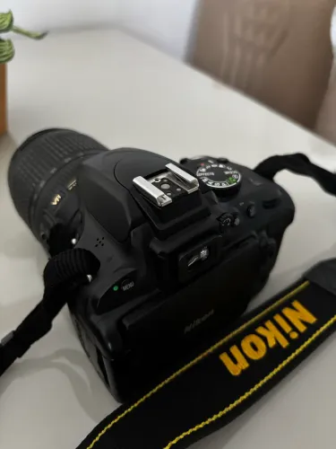  Nikon D5100 + lente nikon 18-105mm VR 