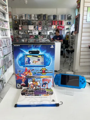 CONSOLE PSP 3001 INVIZIMALS LIMITED EDITION ENTERTAINMENT PACK NA CAIXA - SONY 