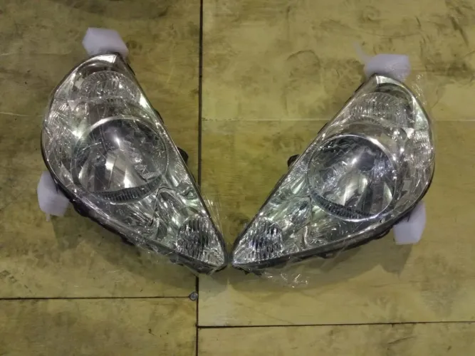 Farol de Honda Fit 2005