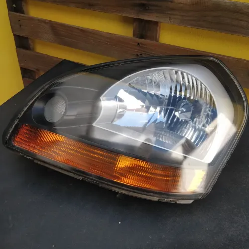 Farol Tucson lado esquerdo (motorista) - ORIGINAL HYUNDAI 