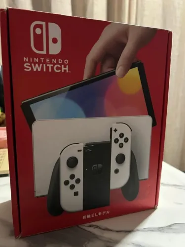 Nintendo Switch OLED + Pro Controller Monster Hunter + SD 256GB