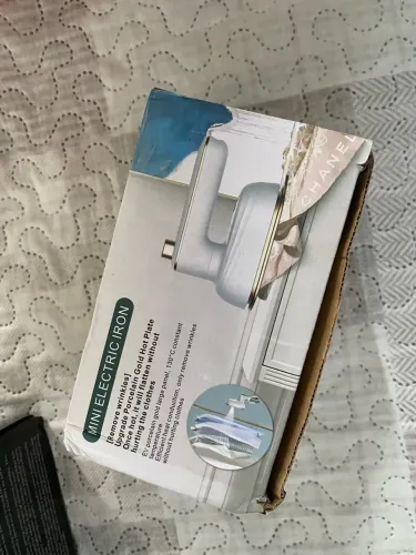 Ferro de passar bivolt portátil R$50