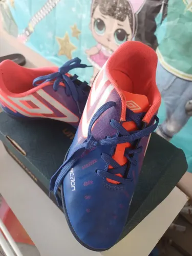 Chuteira Society Infantil Umbro Action<br><br>