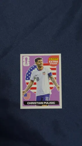 Figurinha extra copa 2026 - pulisic roxa