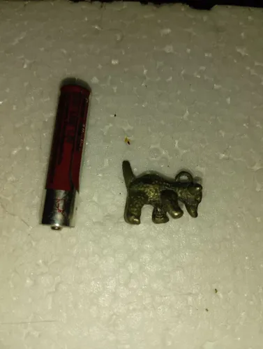Pingente de filhote de urso( um certo metal)