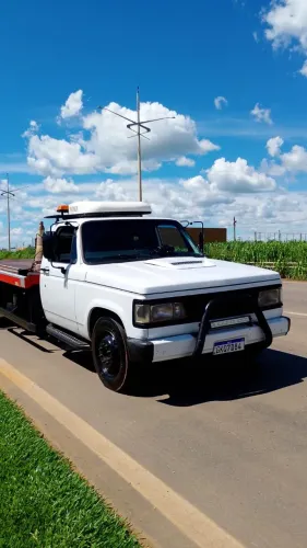 Vendo ou troco Guincho plataforma hidraulica por caminhao roll on 