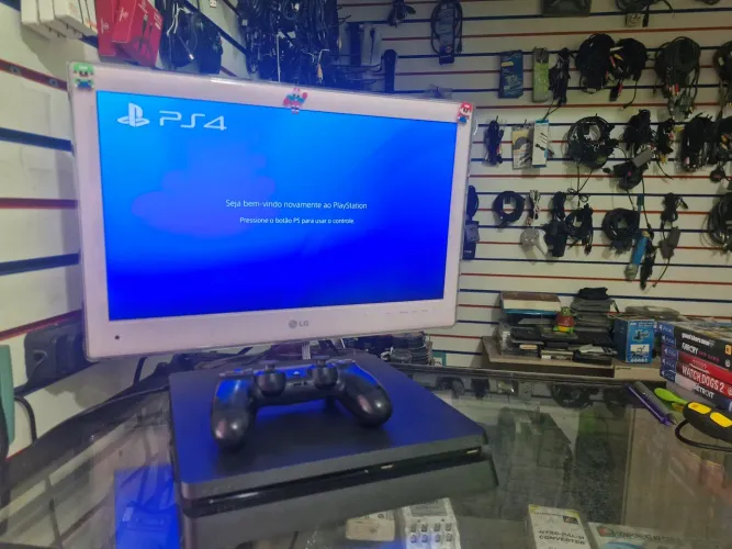 Playstation 4 slim + hd 1 tera + 1 controle aceito cartão de crédito cel 19- *