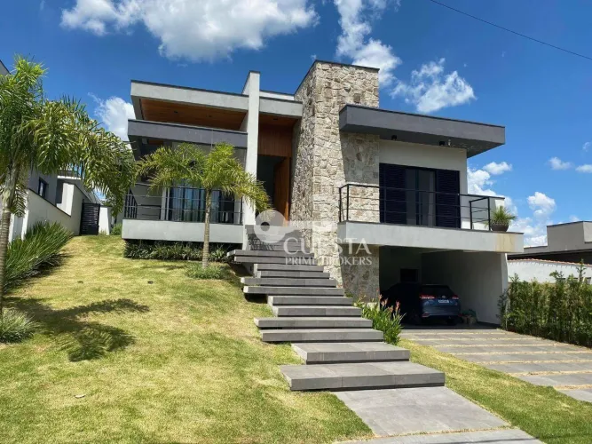 Casa com 3 suítes à venda, 220 m² por R$ 1.290.000 - Condomínio Ninho Verde I Eco Residenc