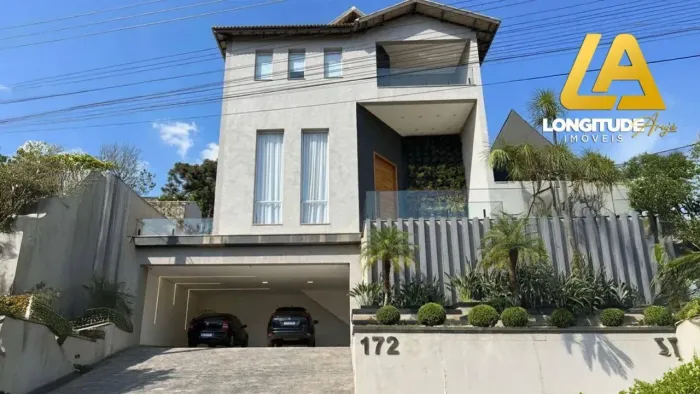 CASA PORTEIRA FECHADA À VENDA NO ARUJÁ HILLS III COM 480M², 4 DORMITÓRIOS, PISCINA AQUECID