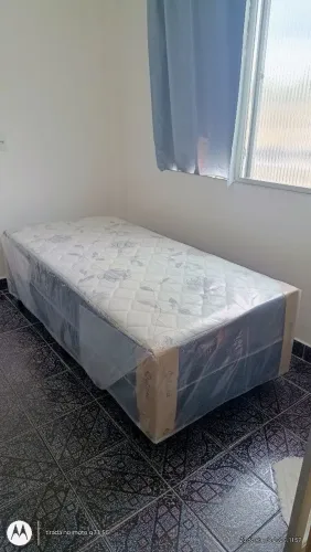 Cama nova de mola.