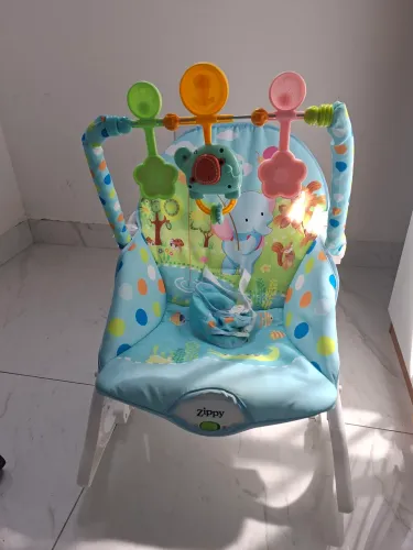 Cadeirinha de balanço e tapete de atividades 