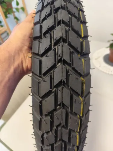 PNEU REMOLD 110/90-17 ? ARO 17
