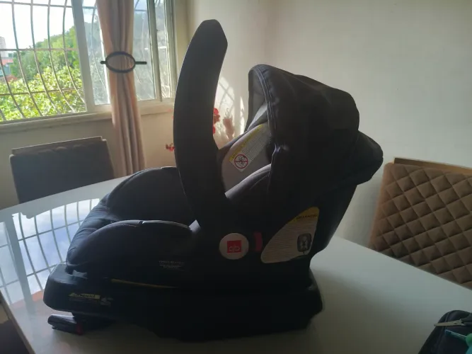 Bebe conforto gb com base , com cinto isofix semi novo tel *