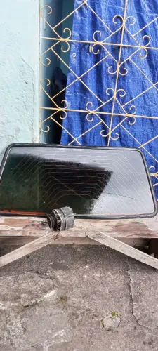 Alternador de uno e vidro traseiro
