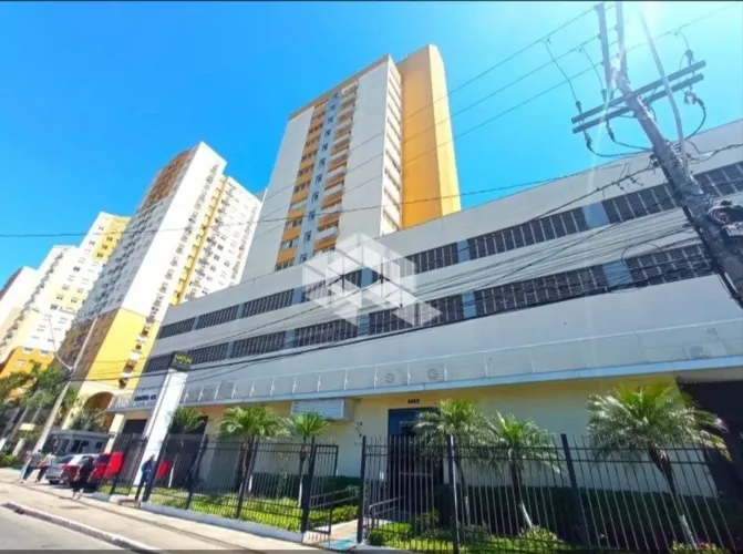 Sala / conjunto comercial com vaga de garagem escriturada à venda no bairro Partenon em Po