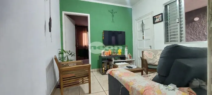 Casa residencial à venda no bairro Vila Rosa com 101 m² e 3 dormitórios/quartos.