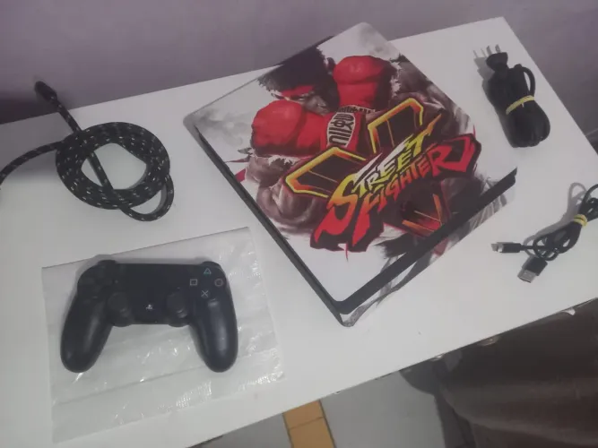 Ps4 slim 500gb + 1 controle + 7 jogoS + todos os caboS