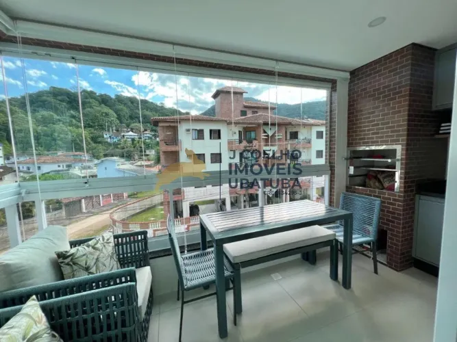 Apartamento de 2 dormitórios com varanda gourmet, à venda na praia das Toninhas em Ubatuba