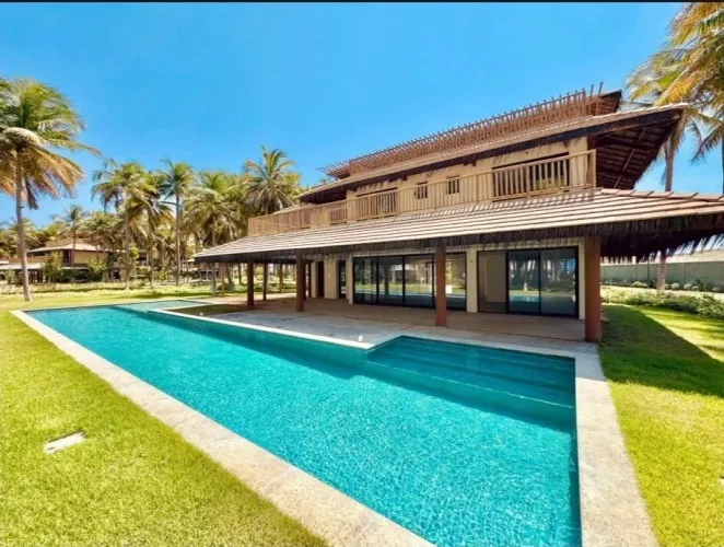 Mansão em condomínio no Fortim 566m², 6 suítes, piscina privativa