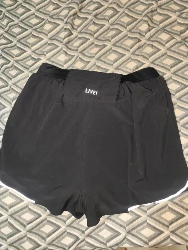 Short Live duplo com bolsos laterais
