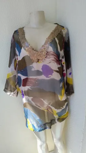 Camisa saída de praia ou gestante, tecido leve, vai muito bem em um Cruziro