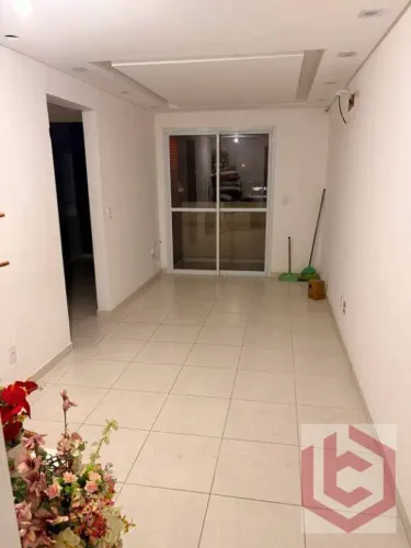 Apartamento com 2 dormitórios para alugar, 53 m² por R$ 1.700 (PACOTE)/mês - Vila Couto -