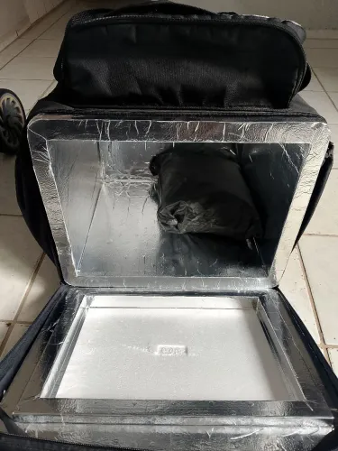 Kit capa de chuva e bag