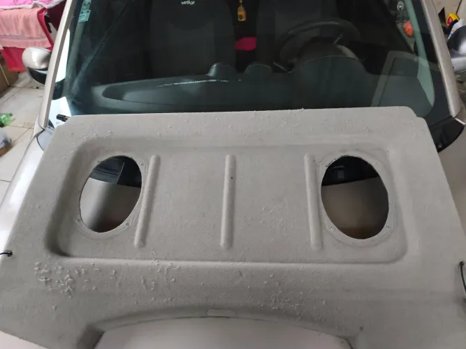 Tampão porta malas do Sandero, original Renault 