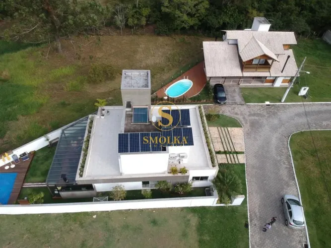 Casa em condomínio fechado à venda, com 3 dormitórios sendo 2 suítes, no Condomínio Terra