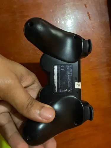 Controle de ps3 original com xixaxis