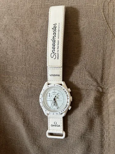 swatch x omega x snoopy bioceramic moonswatch mission to the moonphase full moon