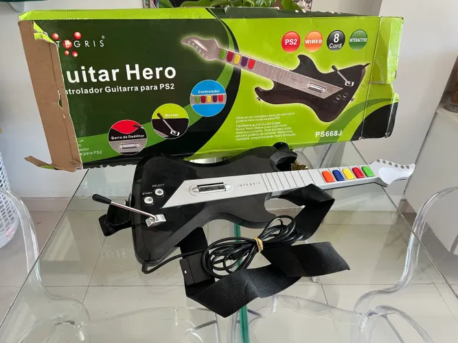 Guitarra do Playstation 2 na caixa