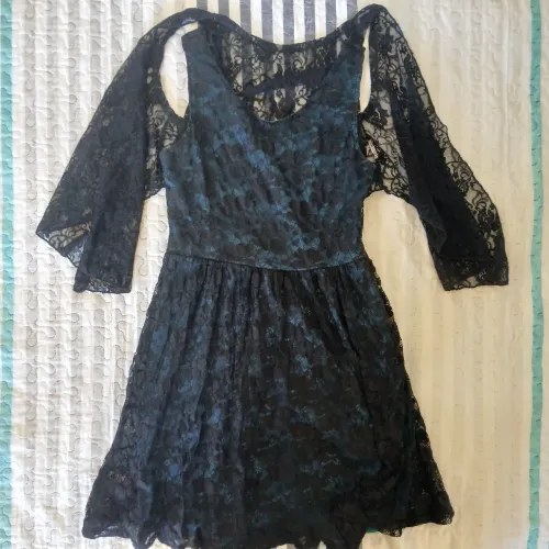 Vestido Rendado Preto Marisa Tam 14 com Manga de Renda