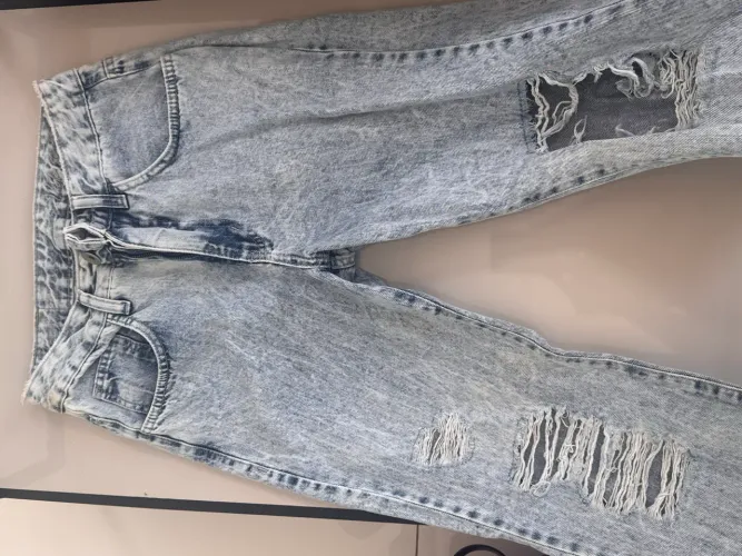 Calça jeans vide bula