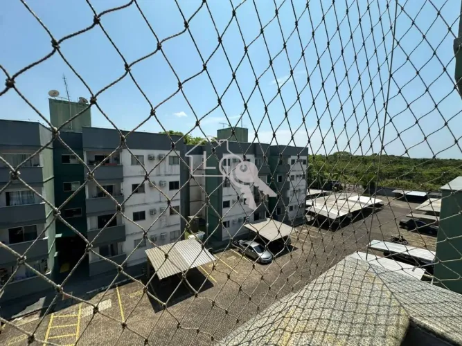 Apartamento com 2 dormitórios para alugar, 56 m² por R$ 1.500,00/mês - Triângulo - Porto V