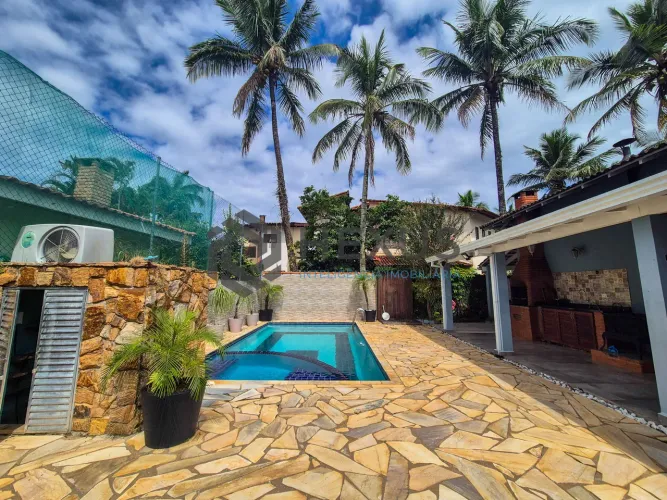 Casa térrea com piscina e área gourmet no Jardim Pernambuco I, Guarujá