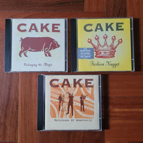 CDs Cake - Motorcade of Generosity, Fashion Nugget, Prolonging the Magic (3 CDs)