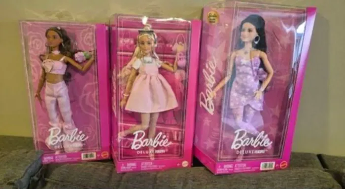 3 barbies deluxe 